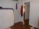 Bare bedroom with wood floors and doorway to another room at 770 Starrsville Rd, Covington, GA 30014