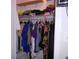 Well-organized walk-in closet with hanging rods and shelving for clothes and accessories at 770 Starrsville Rd, Covington, GA 30014