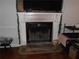Fireplace with a white mantel, perfect for cozy evenings at 770 Starrsville Rd, Covington, GA 30014