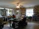 Spacious hobby room with ample natural light, storage shelves, and multiple work stations at 770 Starrsville Rd, Covington, GA 30014