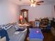 Comfortable living room area featuring a sofa, table, and chair at 770 Starrsville Rd, Covington, GA 30014