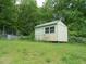 A useful storage shed adds to the property's functionality at 770 Starrsville Rd, Covington, GA 30014