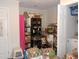 Well-organized storage room with ample shelving and storage containers at 770 Starrsville Rd, Covington, GA 30014