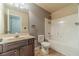 Bathroom showcasing a combination tub and shower with a single vanity at 882 Nestling Dr, Lawrenceville, GA 30045