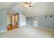 Spacious bedroom featuring plush carpet and ample storage within the roomy double closets at 882 Nestling Dr, Lawrenceville, GA 30045