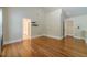 Bright bonus room offering hardwood and carpeted flooring with a neutral color scheme at 882 Nestling Dr, Lawrenceville, GA 30045