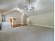 Spacious upstairs bonus room with vaulted ceilings and a ceiling fan at 882 Nestling Dr, Lawrenceville, GA 30045