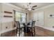 Breakfast nook with hardwood floors, natural light, and a ceiling fan at 882 Nestling Dr, Lawrenceville, GA 30045
