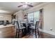 Cozy dining area features a modern table, comfortable seating, and ample natural light at 882 Nestling Dr, Lawrenceville, GA 30045