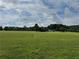 Vast, well-maintained field, ideal for various outdoor activities and recreational enjoyment at 882 Nestling Dr, Lawrenceville, GA 30045