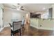 Open kitchen layout with dark wood cabinets, granite countertops, and stainless steel appliances at 882 Nestling Dr, Lawrenceville, GA 30045