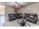 Spacious living room boasts a large sectional sofa, a glass coffee table, and elegant decor at 882 Nestling Dr, Lawrenceville, GA 30045