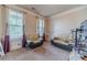 Cozy living room featuring neutral decor, large windows, and comfortable seating at 882 Nestling Dr, Lawrenceville, GA 30045