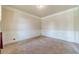 Cozy carpeted room with paneled walls and neutral decor, offering a versatile space at 882 Nestling Dr, Lawrenceville, GA 30045