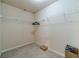 Spacious walk-in closet with ample shelving and storage space at 882 Nestling Dr, Lawrenceville, GA 30045