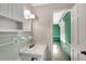 Bathroom featuring a vanity with open shelving and a view into another room at 1055 Heather Ct, Lawrenceville, GA 30043