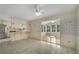 Dining room with stainless steel refrigerator and view to sunroom at 1055 Heather Ct, Lawrenceville, GA 30043