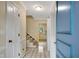 Inviting foyer with staircase and view into adjacent rooms at 1055 Heather Ct, Lawrenceville, GA 30043