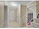 Entryway with stairs leading up and doors to different rooms at 1055 Heather Ct, Lawrenceville, GA 30043