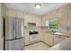 View of kitchen featuring ample counter space and appliances at 1055 Heather Ct, Lawrenceville, GA 30043