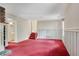 Open living room showcasing stairs, carpeted floors, and natural light at 1055 Heather Ct, Lawrenceville, GA 30043