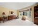 Inviting living room with a bay window, neutral walls, and comfortable seating area at 1470 Rhododendron Nw Dr, Acworth, GA 30102