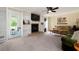 Cozy living room with built-in bookshelves, fireplace, and access to the outside at 1470 Rhododendron Nw Dr, Acworth, GA 30102