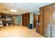 Basement area with wood-look floors, shelving units, and convenient access to storage at 2425 Maclaren Cir, Dunwoody, GA 30360