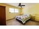 Bright bedroom with ample natural light, ceiling fan, and a cozy, inviting atmosphere at 2425 Maclaren Cir, Dunwoody, GA 30360
