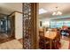 View from the hall showcasing the dining area with hardwood floors and decorative accents at 2425 Maclaren Cir, Dunwoody, GA 30360