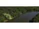Aerial view of the lot showing its proximity to the water and surrounding trees at 5159 Sw East Shore Sw Dr, Conyers, GA 30094