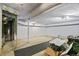 Unfinished basement with exposed ducts, concrete floor, and utilitarian lighting at 5159 Sw East Shore Sw Dr, Conyers, GA 30094