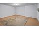 Finished basement features neutral carpeting and a modern geometric rug at 5159 Sw East Shore Sw Dr, Conyers, GA 30094