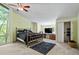Spacious bedroom with large windows, vaulted ceiling, and ample closet space at 5159 Sw East Shore Sw Dr, Conyers, GA 30094