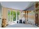 This bedroom offers plenty of space, lots of natural light, and unique bunk beds with tree decorations at 5159 Sw East Shore Sw Dr, Conyers, GA 30094