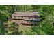 A top-down view of the home showing the multi-level decks and backyard at 5159 Sw East Shore Sw Dr, Conyers, GA 30094