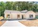Charming, newly renovated home with modern farmhouse style and wooden shutters at 783 Britt Sw Rd, Mableton, GA 30126
