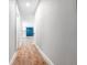 Hallway with wood-look flooring and fresh paint leading to rooms at 783 Britt Sw Rd, Mableton, GA 30126