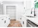 A close up view of the kitchen featuring an island, countertops, and cabinetry at 783 Britt Sw Rd, Mableton, GA 30126