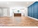 An open concept living space with the kitchen featuring an island and modern appliances at 783 Britt Sw Rd, Mableton, GA 30126