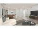 Open basement space with a pool table, couch, and modern furnishings at 1213 Anderson Mill Rd, Austell, GA 30106