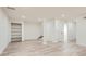 Finished basement area with neutral paint, modern flooring, and built-in shelving at 1213 Anderson Mill Rd, Austell, GA 30106