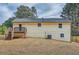 Exterior of home shows a multi-level deck, windows, and siding at 1213 Anderson Mill Rd, Austell, GA 30106