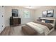 The main bedroom is spacious with an area rug and stylish decor at 1213 Anderson Mill Rd, Austell, GA 30106