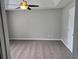 Neutral bedroom featuring a tray ceiling, carpeted floors, and a ceiling fan at 1511 Harbor Watch Ct, Woodstock, GA 30189