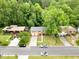 Aerial view of the property showing its close proximity to other well maintained homes at 1563 Greenwood Dr, Norcross, GA 30093
