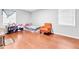 Spacious bedroom with hardwood floors, and abundant natural light from windows at 1563 Greenwood Dr, Norcross, GA 30093