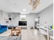 Inviting living room showcases neutral walls, tiled floor, and a variety of modern decor elements at 1563 Greenwood Dr, Norcross, GA 30093