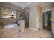 Spacious bathroom with a luxurious tub, glass shower, and elegant tile flooring at 3127 Lenox Ne Rd # 1, Atlanta, GA 30324