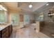 Spacious bathroom with a soaking tub, glass-enclosed shower, and dual sink vanity at 3127 Lenox Ne Rd # 1, Atlanta, GA 30324